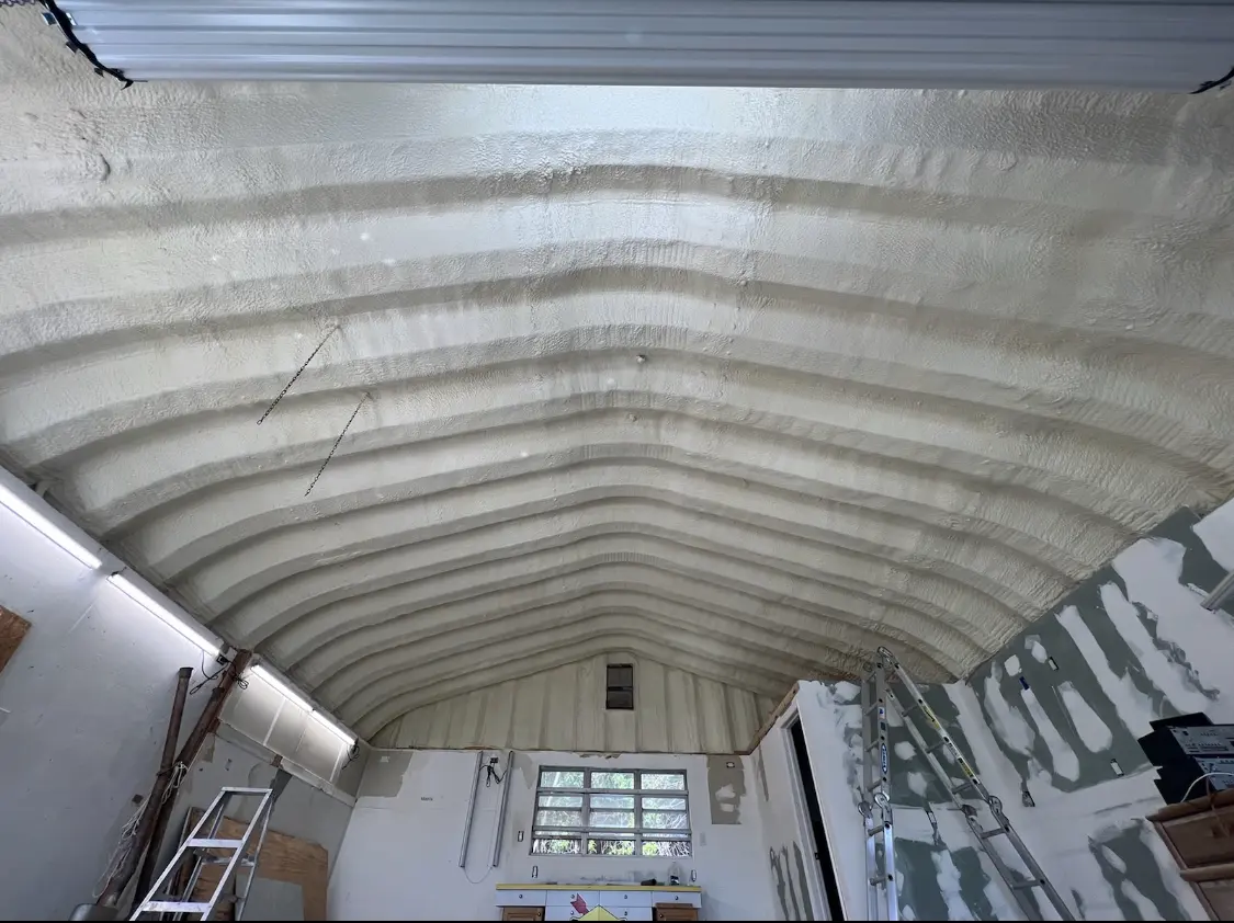 Spray polyurethane foam applied to the underside of a metal roof deck in Selinsgrove